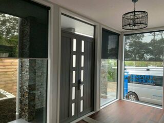 Rechargeable battery motorised roller blinds with solar charge panel for lobby