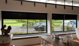 Motorised Light Filtering and Blackout roller blinds in a lifestyle property