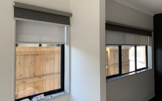 Motorised both inside mount sunscreen and outside mount blackout roller blinds look great
