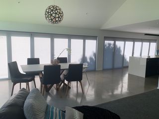 Li-ion rechargeable battery powered motorised roller blinds for whole open areas of Kitchen, dining room and family room