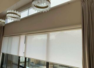 Combine the motorised curtain and motorised Light Filtering Roller blinds 