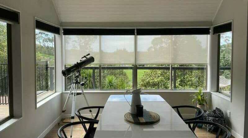 Dual motorised roller blinds for a Point View property
